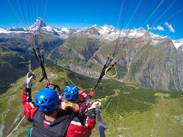 The most amazing, once-in-a-lifetime experience!! Go paragliding with the most breathtaking, jaw-dropping views EVER with the Matterhorn in the background!!! If you are ever anywhere near Switzerland you HAVE to put paragliding in Zermatt on your bucket list!!!! If you mention "Kevin & Amanda" at FlyZermatt.com you'll get a free T-shirt!! They're super cute too!