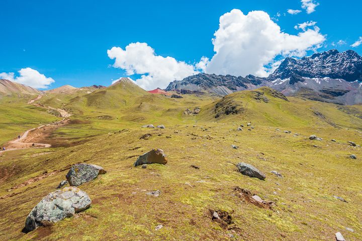 Rainbow Mountain, Peru. Don't go at 3 AM with the tour groups. Sleep in, miss the crowds, and have Rainbow Mountain all to yourself! Read this post for everything you need to know about hiking Rainbow Mountain in Peru.