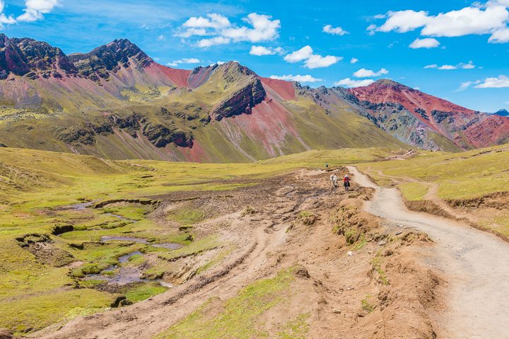 Rainbow Mountain, Peru. Don't go at 3 AM with the tour groups. Sleep in, miss the crowds, and have Rainbow Mountain all to yourself! Read this post for everything you need to know about hiking Rainbow Mountain in Peru.