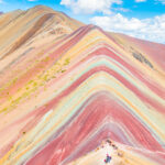 Rainbow Mountain, Peru. Don't go at 3 AM with the tour groups. Sleep in, miss the crowds, and have Rainbow Mountain all to yourself! Read this post for everything you need to know about hiking Rainbow Mountain in Peru. 