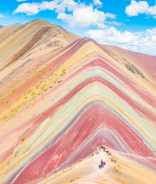 Rainbow Mountain, Peru. Don't go at 3 AM with the tour groups. Sleep in, miss the crowds, and have Rainbow Mountain all to yourself! Read this post for everything you need to know about hiking Rainbow Mountain in Peru.