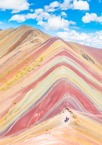 Rainbow Mountain, Peru. Don't go at 3 AM with the tour groups. Sleep in, miss the crowds, and have Rainbow Mountain all to yourself! Read this post for everything you need to know about hiking Rainbow Mountain in Peru. 