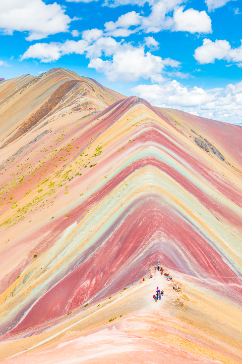 Rainbow Mountain, Peru. Don't go at 3 AM with the tour groups. Sleep in, miss the crowds, and have Rainbow Mountain all to yourself! Read this post for everything you need to know about hiking Rainbow Mountain in Peru.