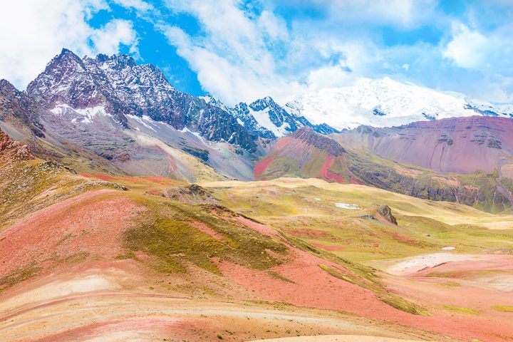 Rainbow Mountain, Peru. Don't go at 3 AM with the tour groups. Sleep in, miss the crowds, and have Rainbow Mountain all to yourself! Read this post for everything you need to know about hiking Rainbow Mountain in Peru.