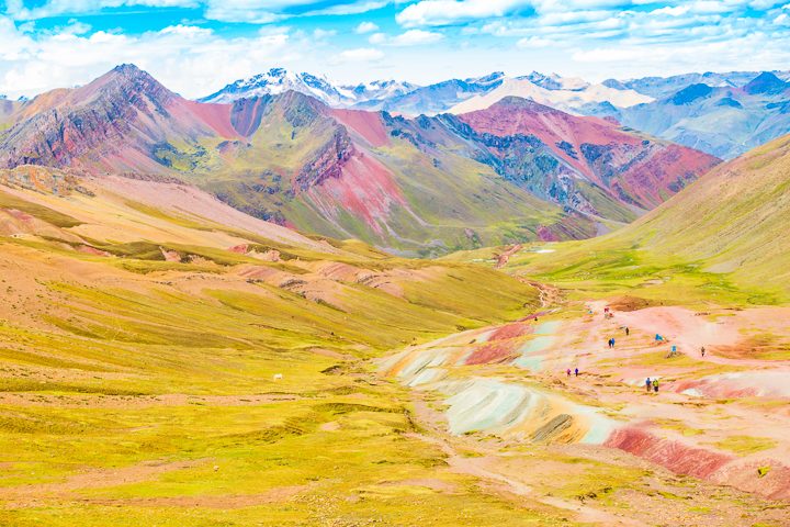 Rainbow Mountain, Peru. Don't go at 3 AM with the tour groups. Sleep in, miss the crowds, and have Rainbow Mountain all to yourself! Read this post for everything you need to know about hiking Rainbow Mountain in Peru.