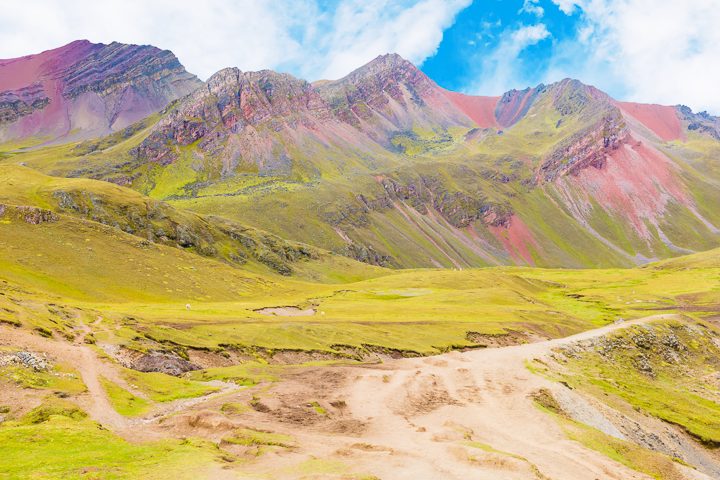 Rainbow Mountain, Peru. Don't go at 3 AM with the tour groups. Sleep in, miss the crowds, and have Rainbow Mountain all to yourself! Read this post for everything you need to know about hiking Rainbow Mountain in Peru.