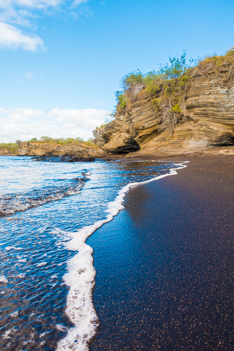 Ultimate Guide to the Galapagos Islands! Where to swim with sea lions, penguins, sea turtles, sharks, giant manta rays, and where to find the volcanic black and red sand beaches. #Santiago #Rabida #Bartolomé #Ecuador