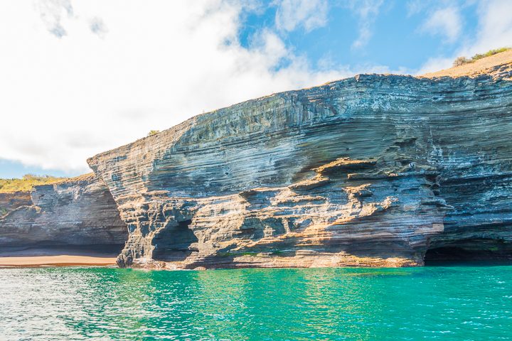 Ultimate Guide to the Galapagos Islands! Where to swim with sea lions, penguins, sea turtles, sharks, giant manta rays, and where to find the volcanic black and red sand beaches. #Santiago #Rabida #Bartolomé #Ecuador