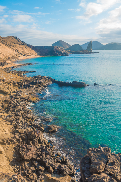 Ultimate Guide to the Galapagos Islands! Where to swim with sea lions, penguins, sea turtles, sharks, giant manta rays, and where to find the volcanic black and red sand beaches. #Santiago #Rabida #Bartolomé #Ecuador