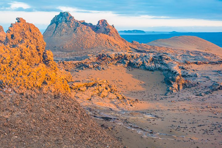 Ultimate Guide to the Galapagos Islands! Where to swim with sea lions, penguins, sea turtles, sharks, giant manta rays, and where to find the volcanic black and red sand beaches. #Santiago #Rabida #Bartolomé #Ecuador