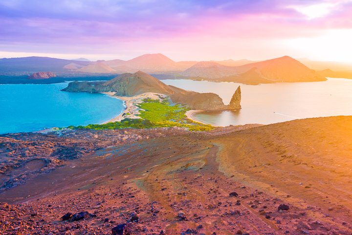 Ultimate Guide to the Galapagos Islands! Where to swim with sea lions, penguins, sea turtles, sharks, giant manta rays, and where to find the volcanic black and red sand beaches. #Santiago #Rabida #Bartolomé #Ecuador