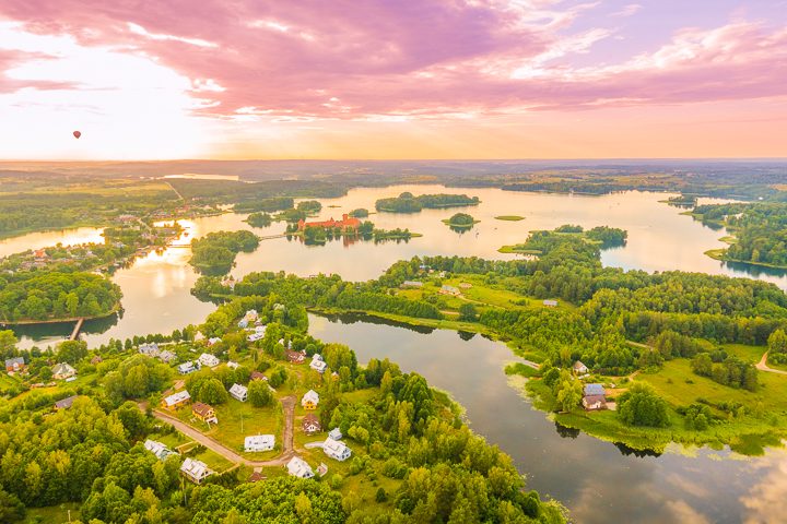 The most romantic day trip you can take from Vilnius!! A sunset hot air balloon ride over a fairytale castle in the gorgeous countryside of Trakai, Lithuania.