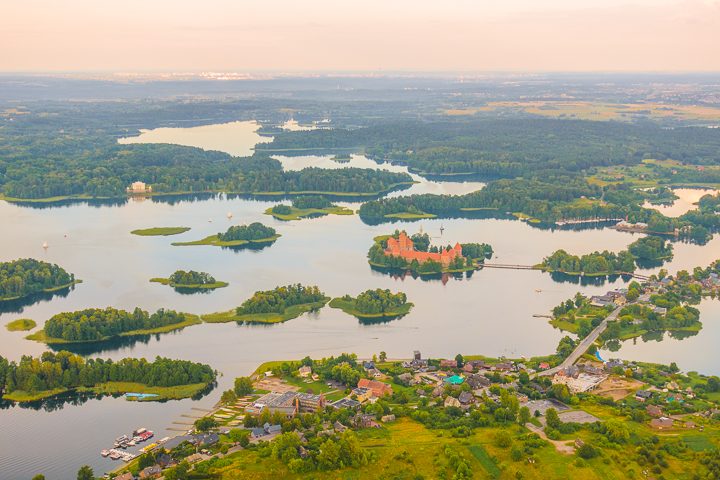 The most romantic day trip you can take from Vilnius!! A sunset hot air balloon ride over a fairytale castle in the gorgeous countryside of Trakai, Lithuania.