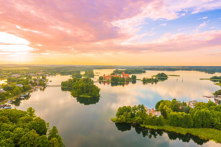The most romantic day trip you can take from Vilnius!! A sunset hot air balloon ride over a fairytale castle in the gorgeous countryside of Trakai, Lithuania.