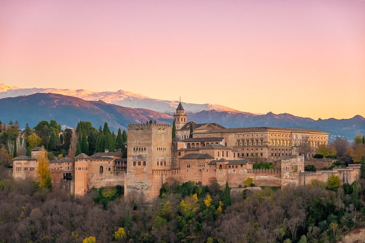 Sunset view of the Alhambra from Mirador San Nicolás in Granada Spain