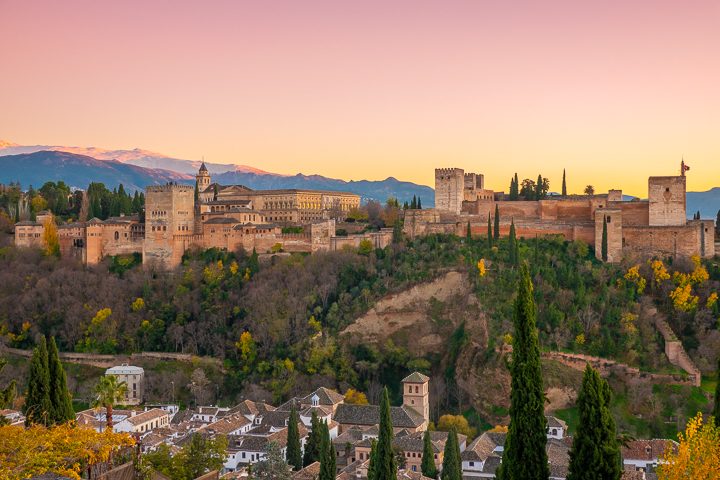 Sunset view of the Alhambra from Mirador San Nicolás in Granada Spain