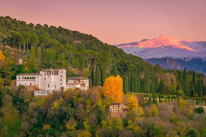 Sunset view from Mirador San Nicolás in Granada Spain