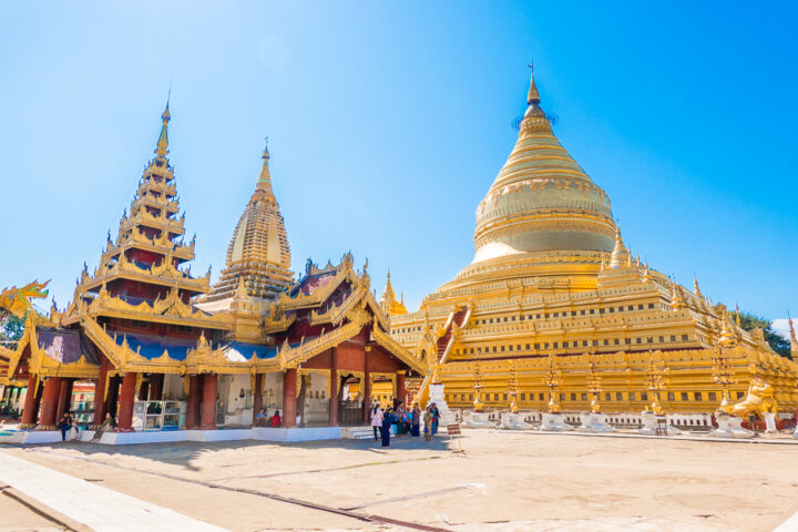 Further back image of the gold plated Shwezigon Pagoda in Bagan, Myanmar.