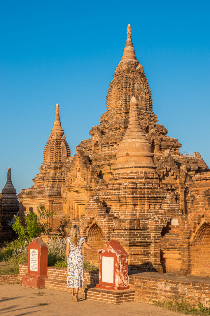 Amanda standing in front of the Yin-ma-na-hpaya Temple in Bagan, Myanmar.