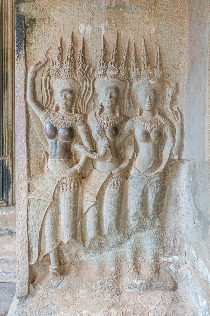 Detailed carvings on the walls of Angkor Wat