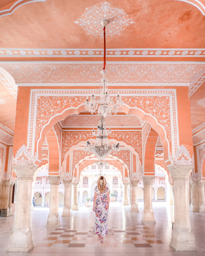 A courtyard inside the City Palace made of white marble and red sandstone.