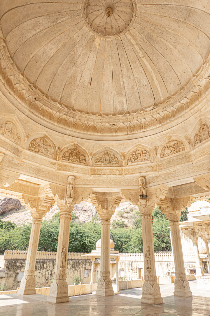 Detailed marble columns outside of The Royal Tombs in Jaipur, India.