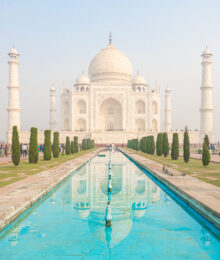 Image of the Taj Mahal from the edge of the reflecting pool.