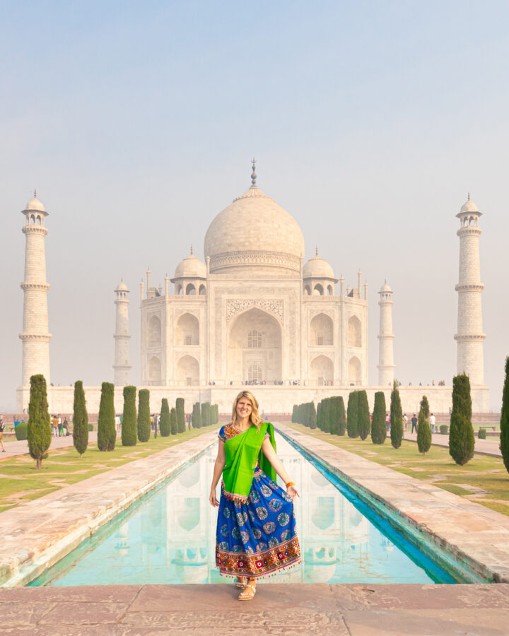 Amanda posing in from of the Taj Mahal reflecting pool.