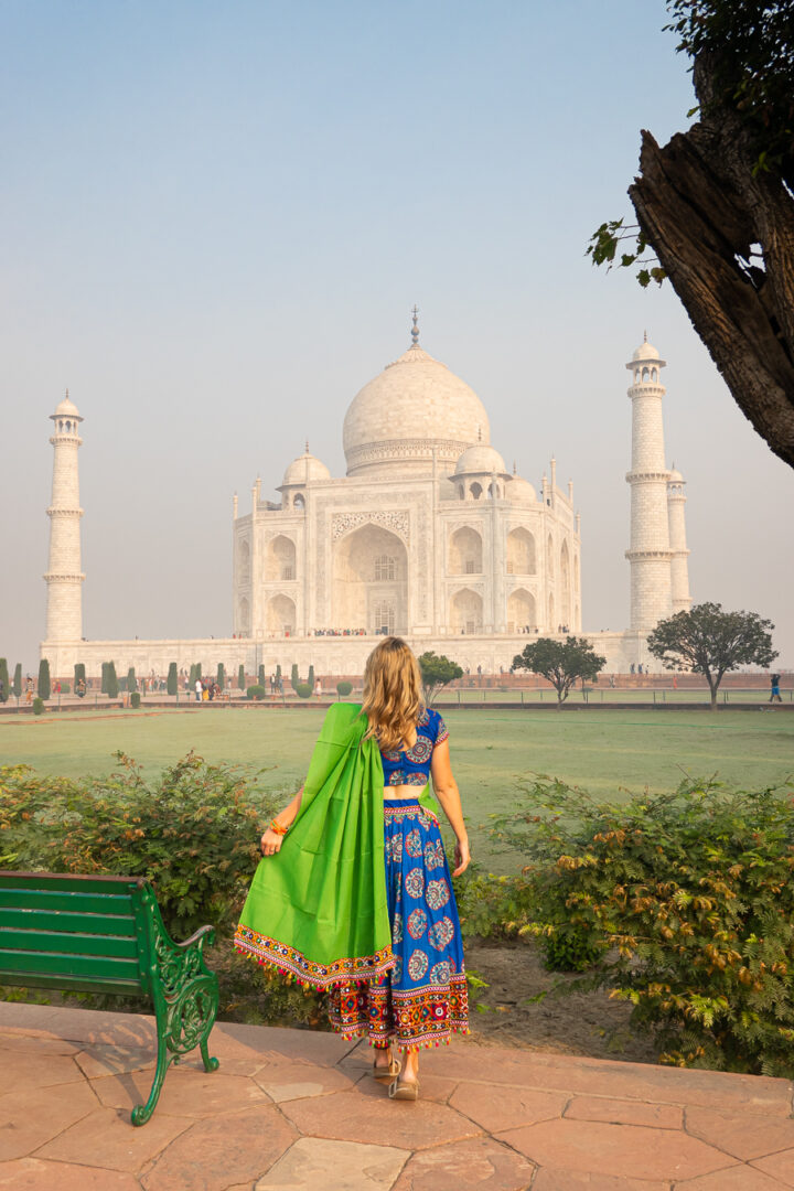 Woman looking towards the Taj Mahal.