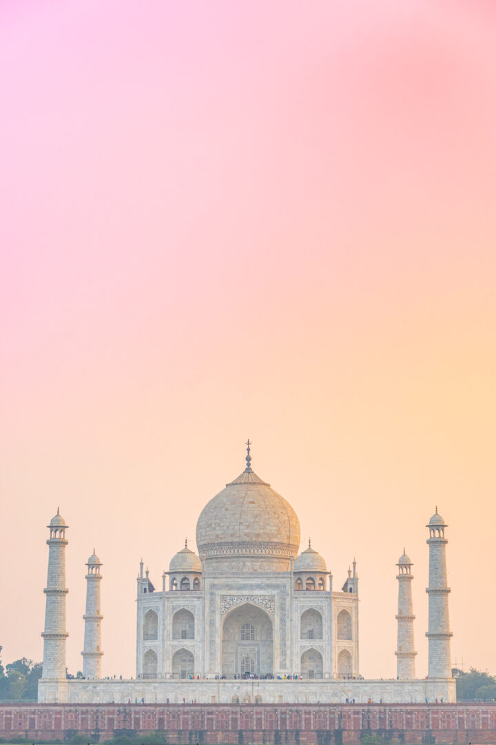 Sunset view of the Taj Mahal from across the river.