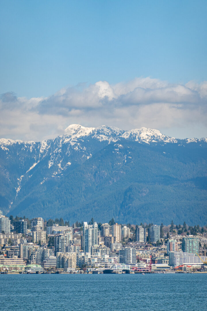 Vancouver city skyline with snow capped mountains in the background