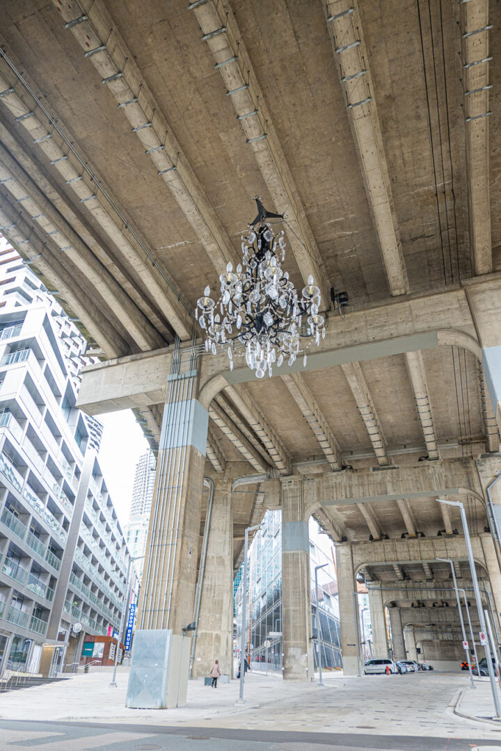 Massive ornate Chandelier hanging under a bridge