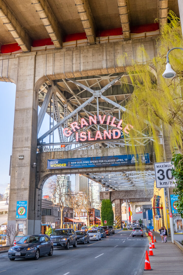 Granville Island Neon Sign under the bridge