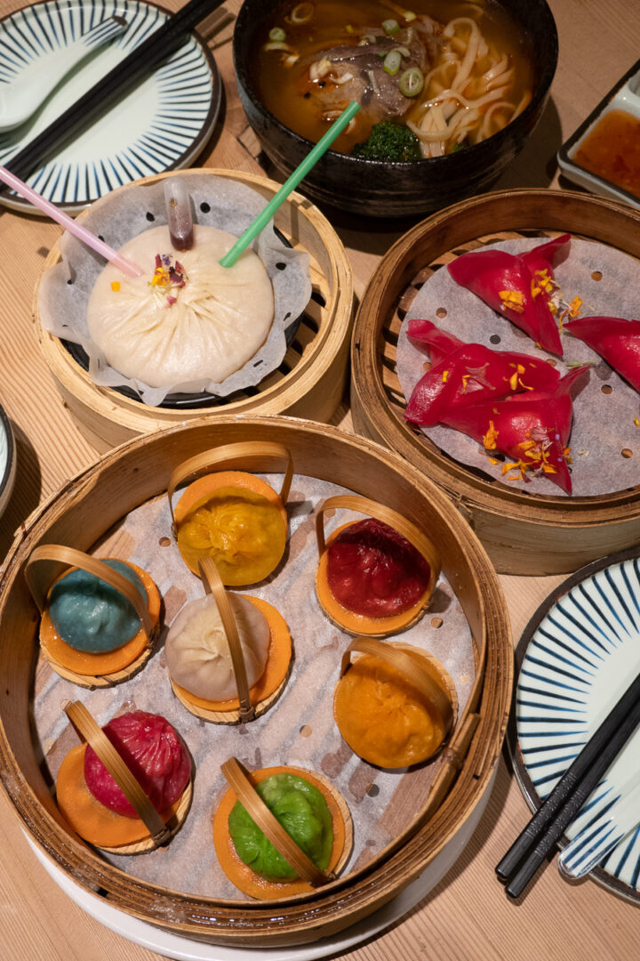 rainbow colored bao buns and dumplings